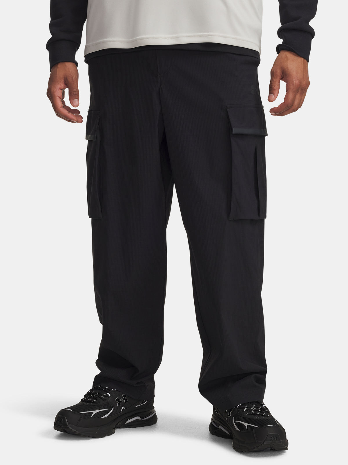 Férfi sportnadrág Under Armour UA UNSTPBLE TXTR WOVEN CARGO-BLK fekete nadrág