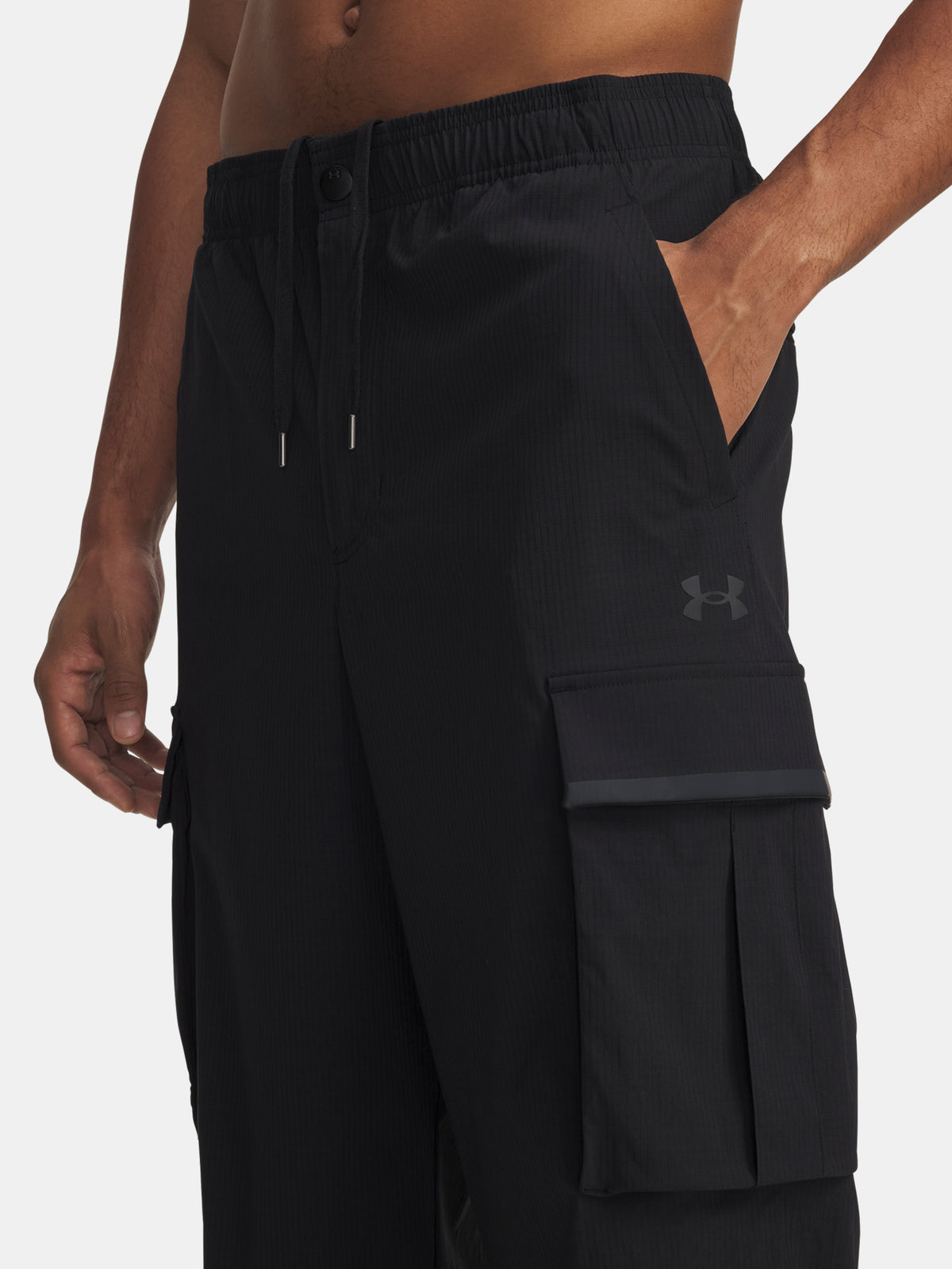 Férfi sportnadrág Under Armour UA UNSTPBLE TXTR WOVEN CARGO-BLK fekete nadrág