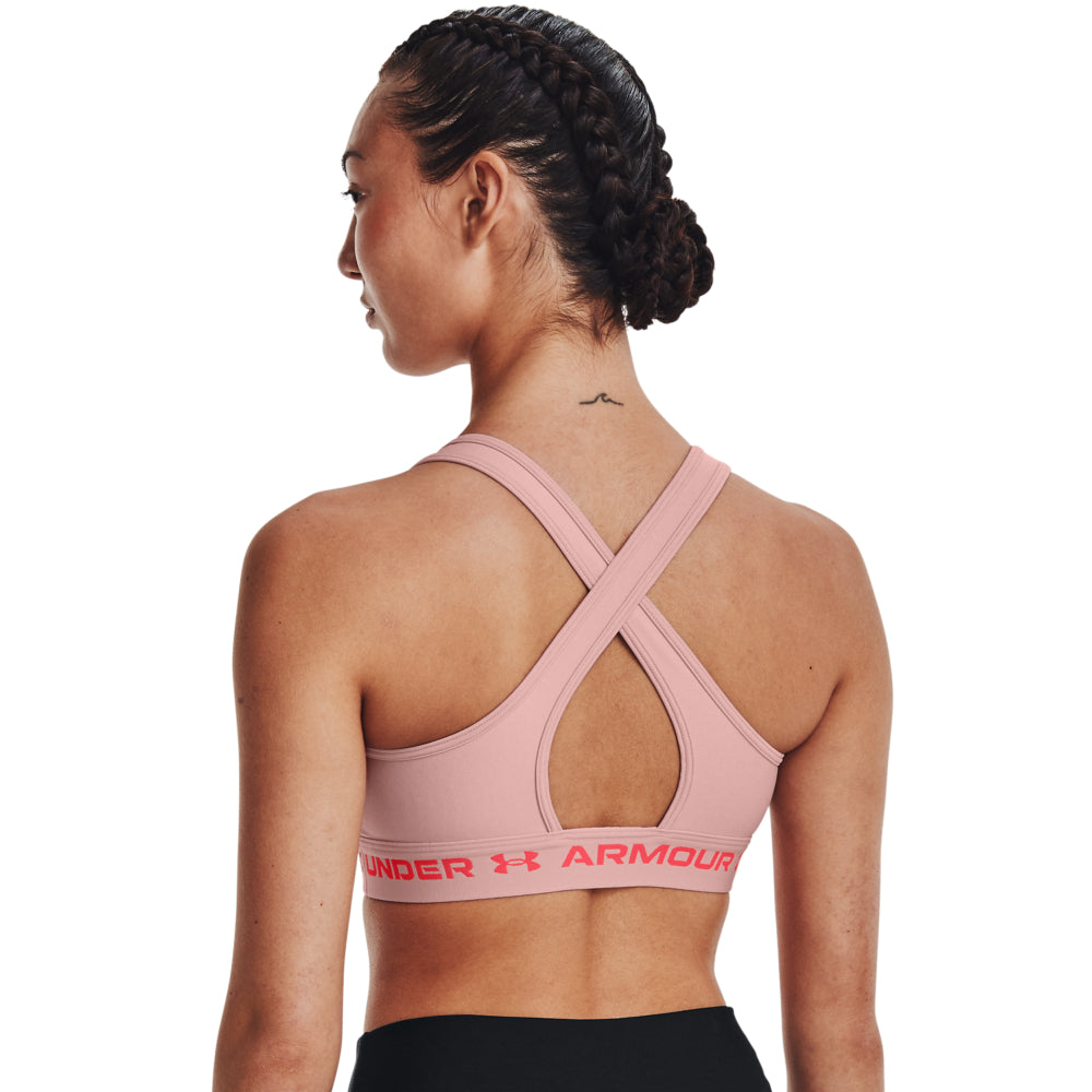 Nõi melltartó Under Armour UA Crossback Mid Hthr rózsaszín sportmelltartó