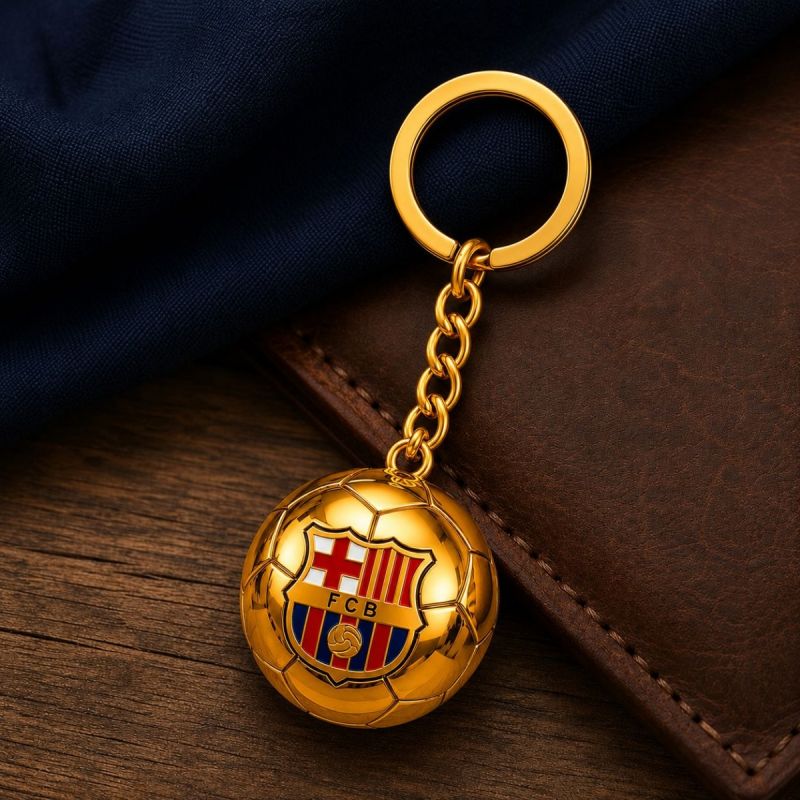 FC Barcelona original licensed keychain in the shape of a golden with the coat of arms złoty labda B7081